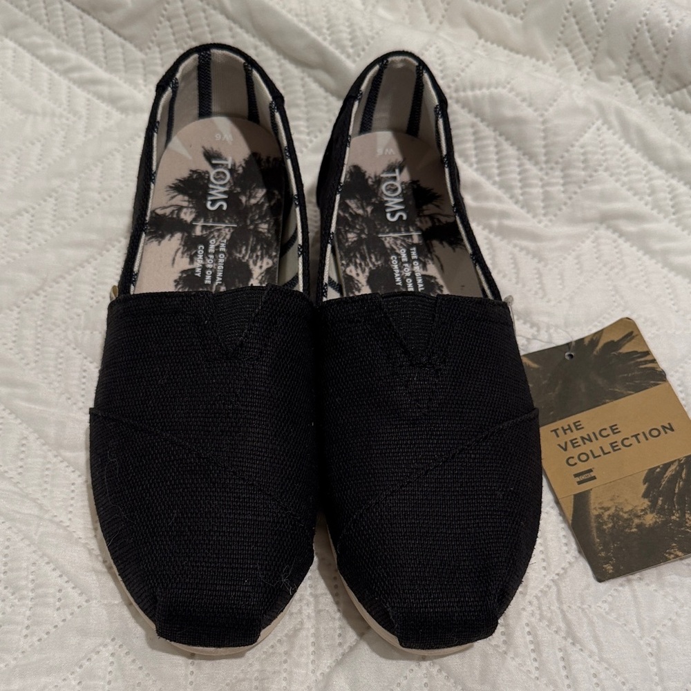 TOMS Classic Black Canvas Slip-Ons
